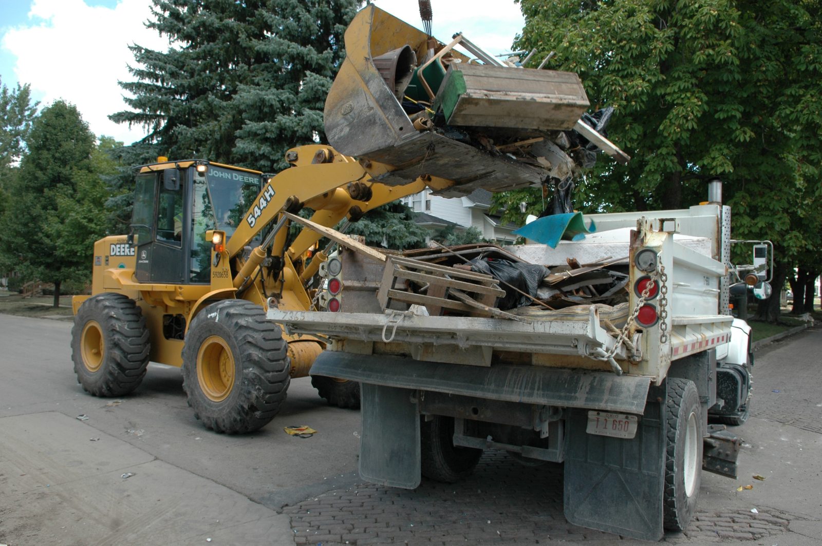 Ohio transportation officials clear flood debris from the Blanchard River after a flood