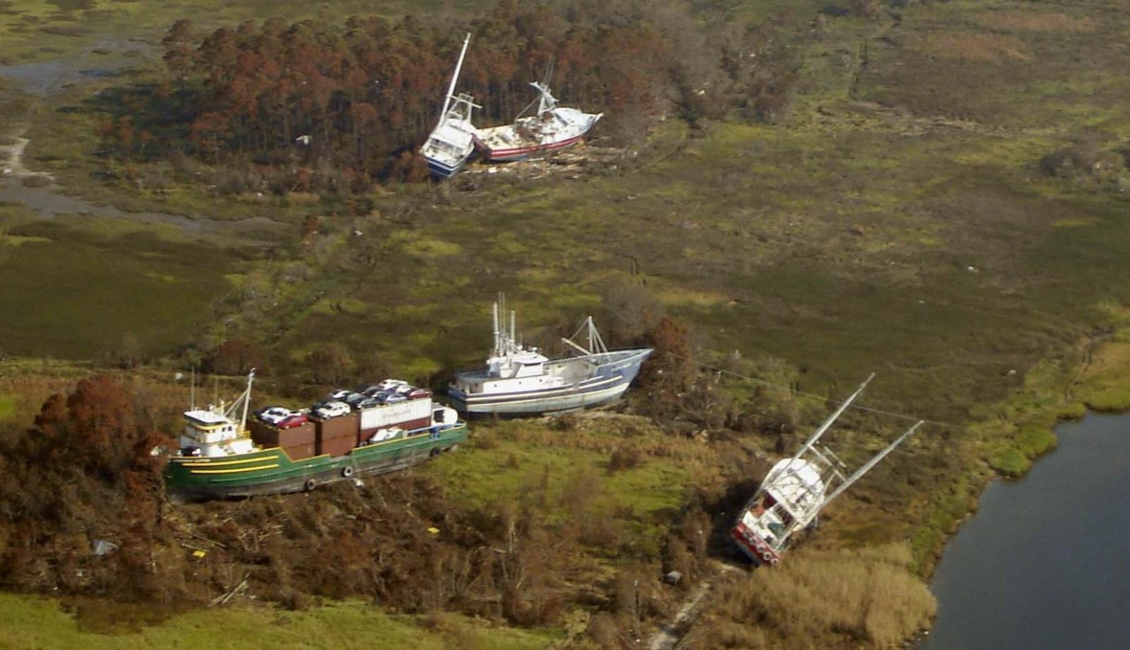 Boats and debris washed ashore in Bayou La Batre, Alabama, by Hurricane Katrina's storm surge
