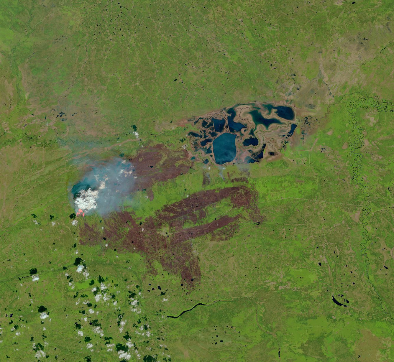 Satellite image from Landsat 8 showing smoke from wildfires in Alberta and British Columbia filling the skies over western Canada and much of the United States on 26 May 2023