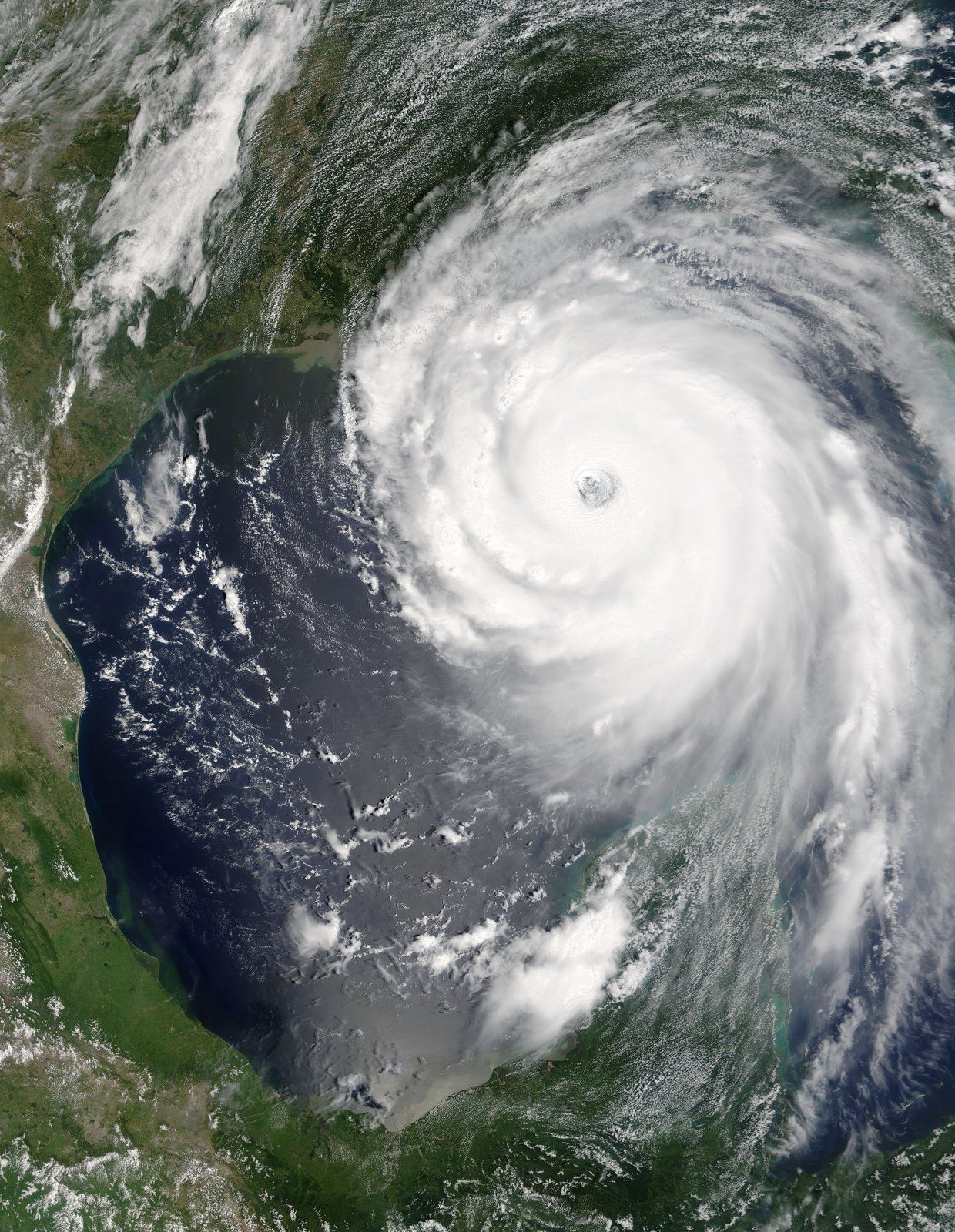 NASA satellite image of Hurricane Katrina on 28 August 2005, showing a large hurricane with a well-defined eye